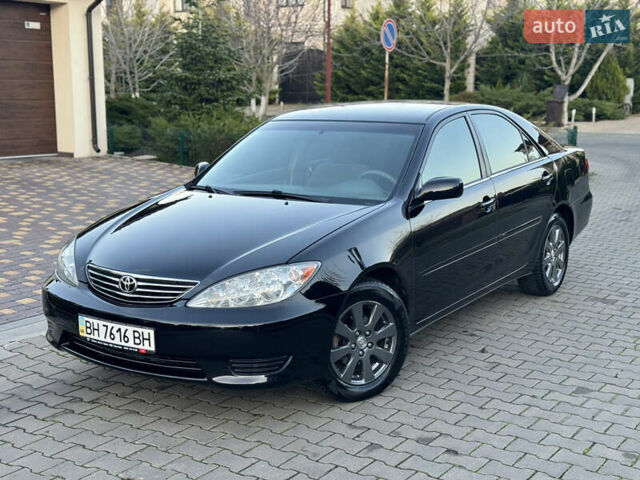 Черный Тойота Камри, объемом двигателя 2.36 л и пробегом 98 тыс. км за 8700 $, фото 2 на Automoto.ua