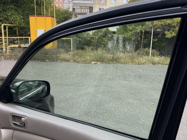 Черный Тойота Камри, объемом двигателя 2.4 л и пробегом 180 тыс. км за 6000 $, фото 14 на Automoto.ua