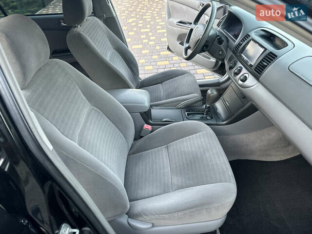 Черный Тойота Камри, объемом двигателя 2.36 л и пробегом 98 тыс. км за 8700 $, фото 72 на Automoto.ua