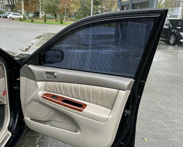 Чорний Тойота Камрі, об'ємом двигуна 2.4 л та пробігом 292 тис. км за 5350 $, фото 11 на Automoto.ua