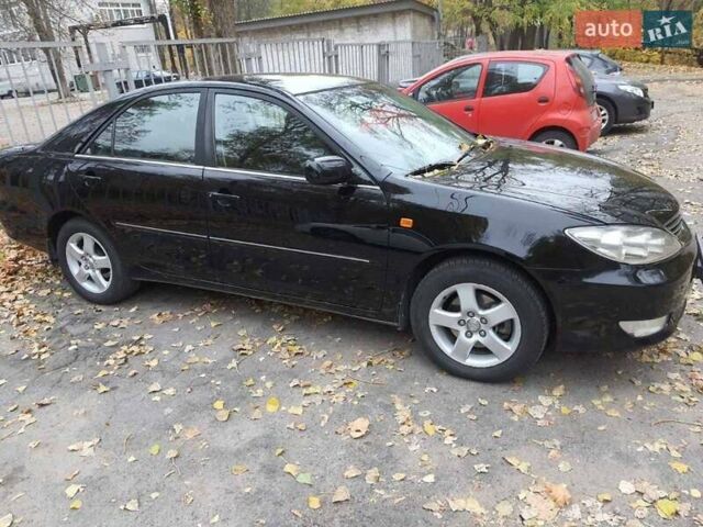 Чорний Тойота Камрі, об'ємом двигуна 3 л та пробігом 218 тис. км за 6400 $, фото 9 на Automoto.ua