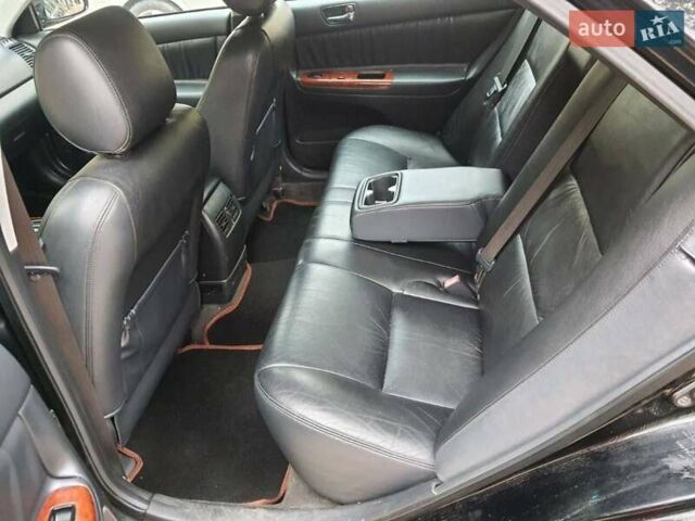 Чорний Тойота Камрі, об'ємом двигуна 3 л та пробігом 218 тис. км за 6400 $, фото 11 на Automoto.ua