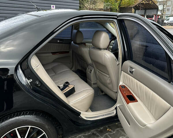 Чорний Тойота Камрі, об'ємом двигуна 2.4 л та пробігом 292 тис. км за 5350 $, фото 12 на Automoto.ua