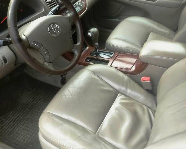 Чорний Тойота Камрі, об'ємом двигуна 3 л та пробігом 208 тис. км за 6700 $, фото 3 на Automoto.ua