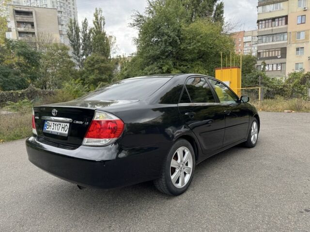 Черный Тойота Камри, объемом двигателя 2.4 л и пробегом 180 тыс. км за 6000 $, фото 2 на Automoto.ua