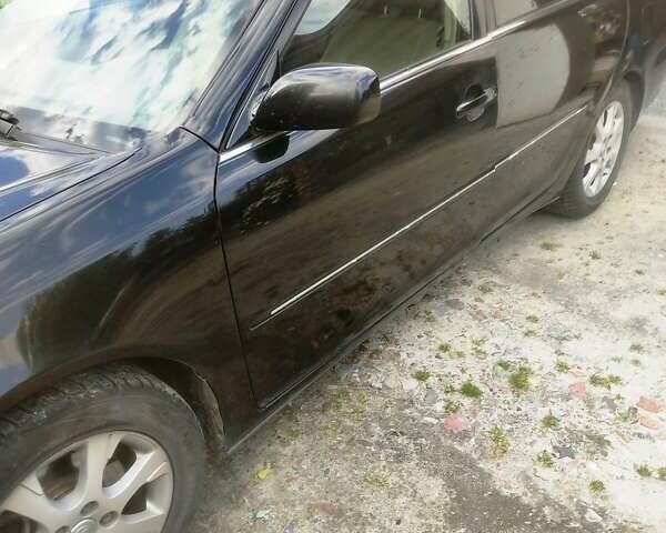 Чорний Тойота Камрі, об'ємом двигуна 3 л та пробігом 208 тис. км за 6700 $, фото 36 на Automoto.ua