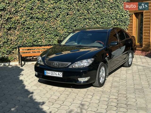 Черный Тойота Камри, объемом двигателя 2.36 л и пробегом 253 тыс. км за 6900 $, фото 5 на Automoto.ua