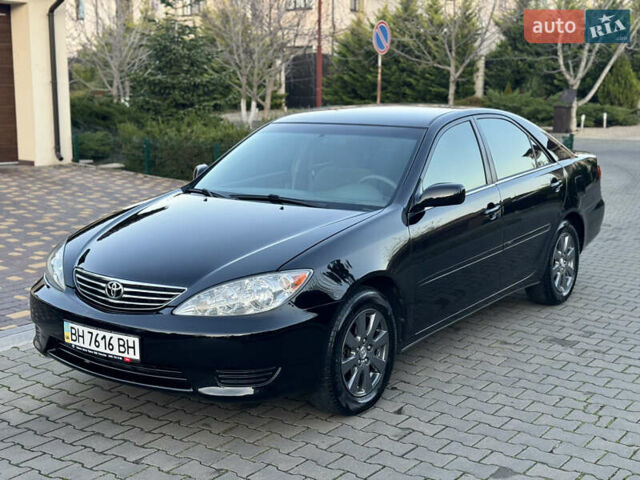 Черный Тойота Камри, объемом двигателя 2.36 л и пробегом 98 тыс. км за 8700 $, фото 9 на Automoto.ua