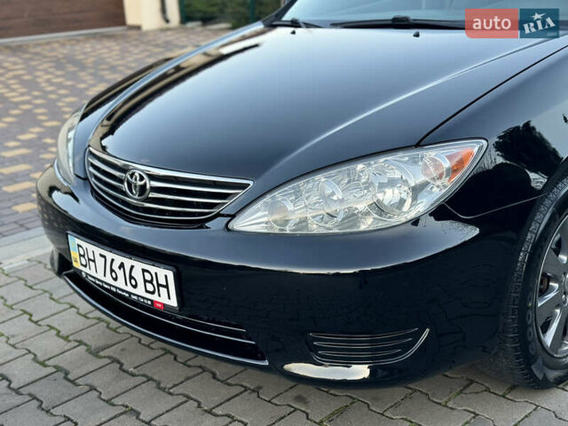 Черный Тойота Камри, объемом двигателя 2.36 л и пробегом 98 тыс. км за 8700 $, фото 10 на Automoto.ua