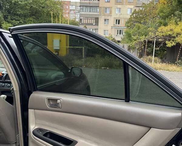 Чорний Тойота Камрі, об'ємом двигуна 2.36 л та пробігом 180 тис. км за 6000 $, фото 16 на Automoto.ua