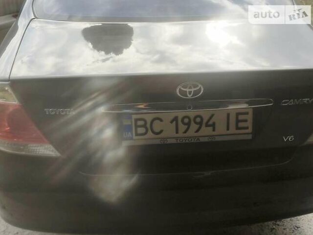 Чорний Тойота Камрі, об'ємом двигуна 3 л та пробігом 208 тис. км за 6700 $, фото 29 на Automoto.ua