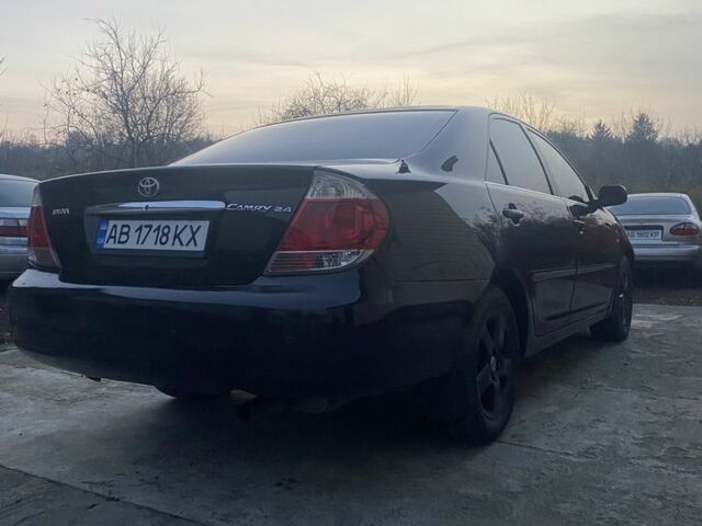 Черный Тойота Камри, объемом двигателя 2.4 л и пробегом 300 тыс. км за 7500 $, фото 4 на Automoto.ua