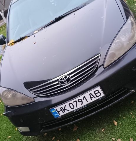 Чорний Тойота Камрі, об'ємом двигуна 0 л та пробігом 300 тис. км за 5100 $, фото 8 на Automoto.ua