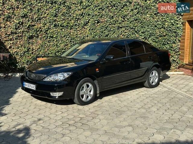 Черный Тойота Камри, объемом двигателя 2.36 л и пробегом 253 тыс. км за 6900 $, фото 2 на Automoto.ua