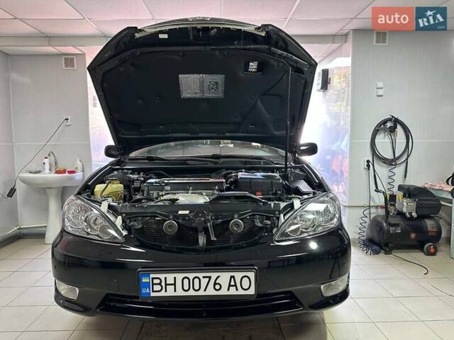 Черный Тойота Камри, объемом двигателя 2.36 л и пробегом 253 тыс. км за 6900 $, фото 16 на Automoto.ua