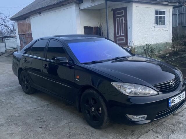 Черный Тойота Камри, объемом двигателя 2.4 л и пробегом 300 тыс. км за 7500 $, фото 8 на Automoto.ua