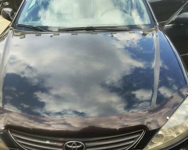 Чорний Тойота Камрі, об'ємом двигуна 3 л та пробігом 208 тис. км за 6700 $, фото 22 на Automoto.ua