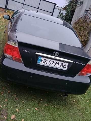 Чорний Тойота Камрі, об'ємом двигуна 2.4 л та пробігом 300 тис. км за 5500 $, фото 8 на Automoto.ua