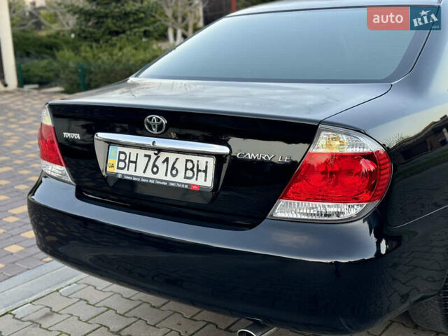 Черный Тойота Камри, объемом двигателя 2.36 л и пробегом 98 тыс. км за 8700 $, фото 23 на Automoto.ua