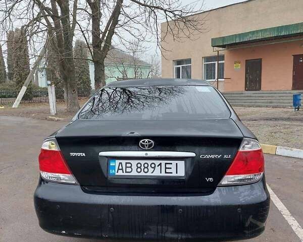 Чорний Тойота Камрі, об'ємом двигуна 3 л та пробігом 267 тис. км за 7500 $, фото 6 на Automoto.ua