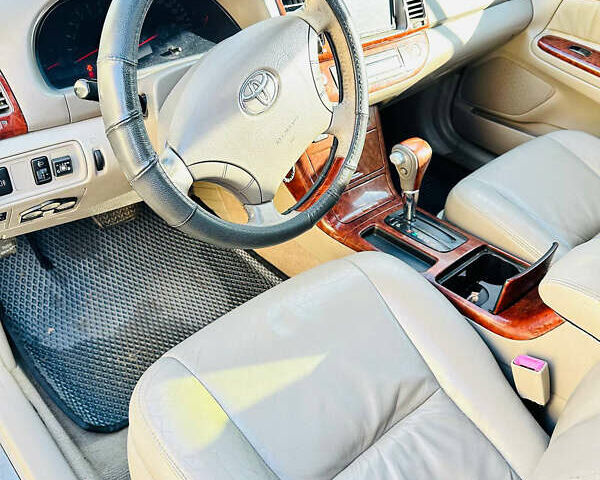 Черный Тойота Камри, объемом двигателя 2.4 л и пробегом 253 тыс. км за 6100 $, фото 10 на Automoto.ua