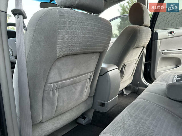 Черный Тойота Камри, объемом двигателя 2.36 л и пробегом 98 тыс. км за 8700 $, фото 63 на Automoto.ua