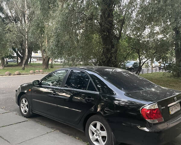 Чорний Тойота Камрі, об'ємом двигуна 3 л та пробігом 409 тис. км за 6000 $, фото 3 на Automoto.ua