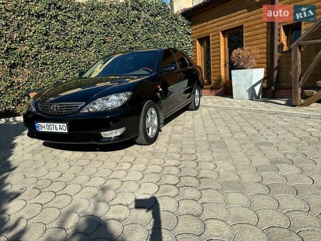Черный Тойота Камри, объемом двигателя 2.36 л и пробегом 253 тыс. км за 6900 $, фото 3 на Automoto.ua