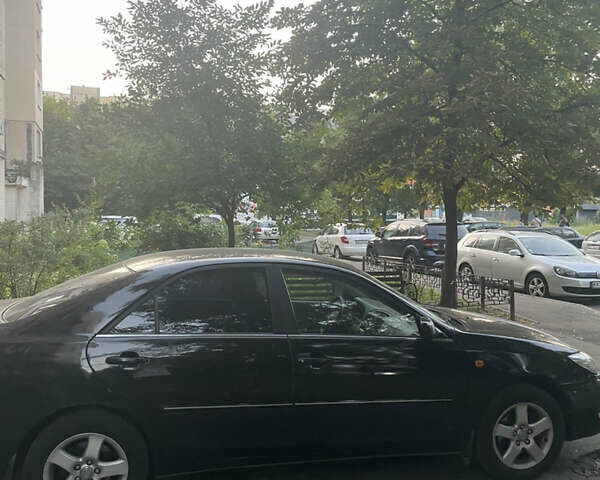 Чорний Тойота Камрі, об'ємом двигуна 3 л та пробігом 409 тис. км за 6000 $, фото 6 на Automoto.ua