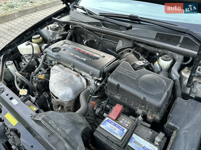 Черный Тойота Камри, объемом двигателя 2.36 л и пробегом 98 тыс. км за 8700 $, фото 84 на Automoto.ua