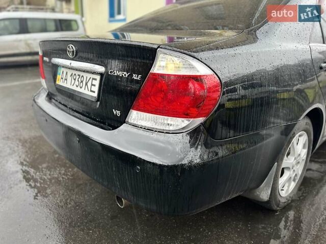 Черный Тойота Камри, объемом двигателя 3 л и пробегом 315 тыс. км за 5700 $, фото 1 на Automoto.ua