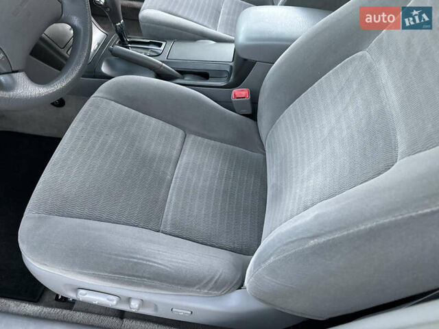 Черный Тойота Камри, объемом двигателя 2.36 л и пробегом 98 тыс. км за 8700 $, фото 68 на Automoto.ua