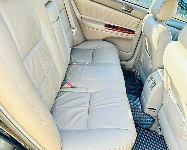 Черный Тойота Камри, объемом двигателя 2.4 л и пробегом 253 тыс. км за 6100 $, фото 12 на Automoto.ua