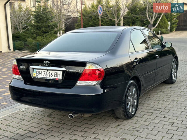 Черный Тойота Камри, объемом двигателя 2.36 л и пробегом 98 тыс. км за 8700 $, фото 25 на Automoto.ua