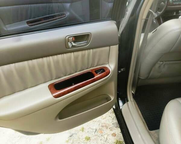 Чорний Тойота Камрі, об'ємом двигуна 3 л та пробігом 208 тис. км за 6700 $, фото 6 на Automoto.ua