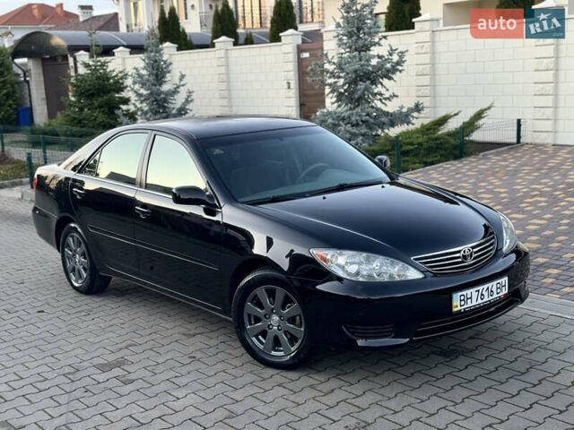 Черный Тойота Камри, объемом двигателя 2.36 л и пробегом 98 тыс. км за 8700 $, фото 31 на Automoto.ua