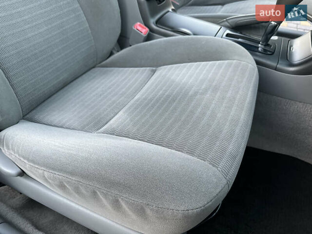 Черный Тойота Камри, объемом двигателя 2.36 л и пробегом 98 тыс. км за 8700 $, фото 74 на Automoto.ua