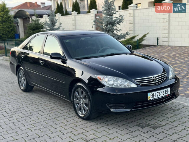 Черный Тойота Камри, объемом двигателя 2.36 л и пробегом 98 тыс. км за 8700 $, фото 29 на Automoto.ua