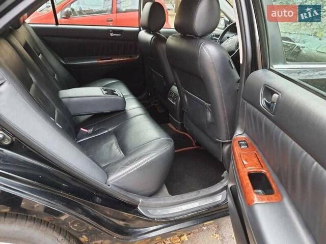 Чорний Тойота Камрі, об'ємом двигуна 3 л та пробігом 218 тис. км за 6400 $, фото 2 на Automoto.ua