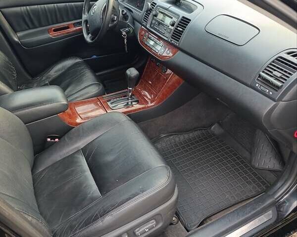 Черный Тойота Камри, объемом двигателя 3 л и пробегом 210 тыс. км за 7200 $, фото 12 на Automoto.ua
