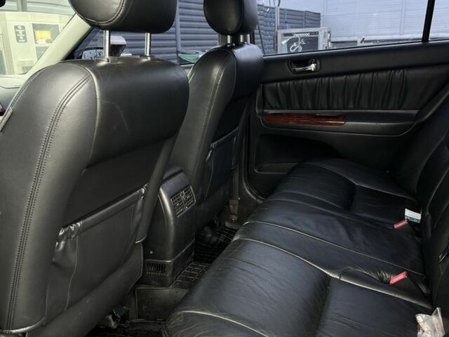 Черный Тойота Камри, объемом двигателя 2.4 л и пробегом 278 тыс. км за 5200 $, фото 13 на Automoto.ua