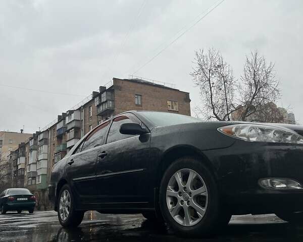 Черный Тойота Камри, объемом двигателя 3 л и пробегом 315 тыс. км за 5700 $, фото 4 на Automoto.ua