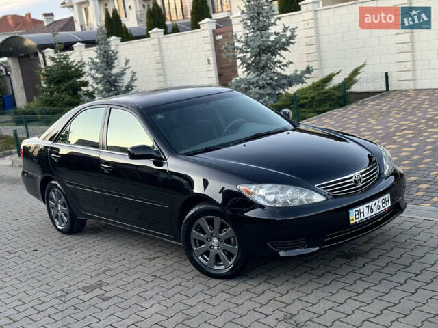 Черный Тойота Камри, объемом двигателя 2.36 л и пробегом 98 тыс. км за 8700 $, фото 33 на Automoto.ua