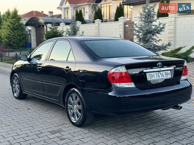 Черный Тойота Камри, объемом двигателя 2.36 л и пробегом 98 тыс. км за 8700 $, фото 13 на Automoto.ua