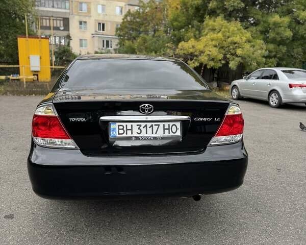 Чорний Тойота Камрі, об'ємом двигуна 2.36 л та пробігом 180 тис. км за 6000 $, фото 8 на Automoto.ua