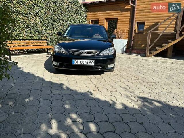 Черный Тойота Камри, объемом двигателя 2.36 л и пробегом 253 тыс. км за 6900 $, фото 7 на Automoto.ua