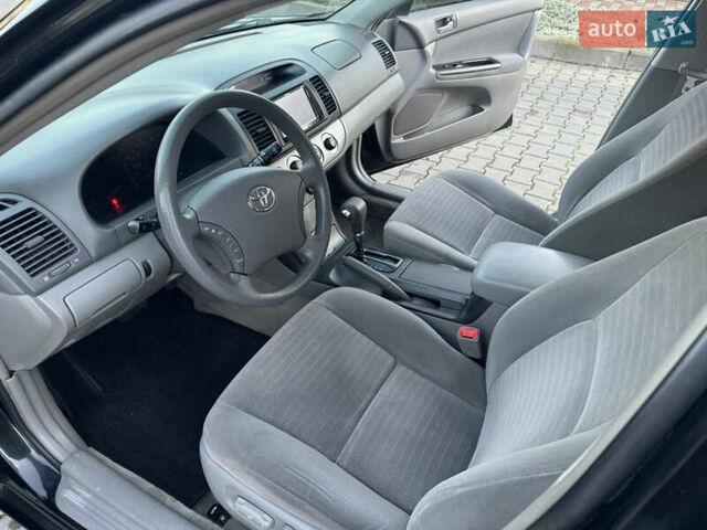 Черный Тойота Камри, объемом двигателя 2.36 л и пробегом 98 тыс. км за 8700 $, фото 41 на Automoto.ua