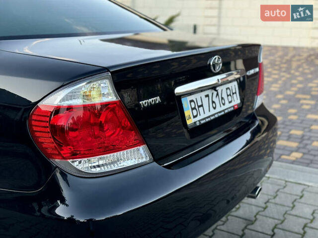 Черный Тойота Камри, объемом двигателя 2.36 л и пробегом 98 тыс. км за 8700 $, фото 16 на Automoto.ua
