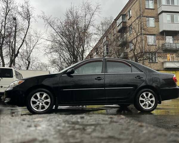 Черный Тойота Камри, объемом двигателя 3 л и пробегом 315 тыс. км за 5700 $, фото 3 на Automoto.ua