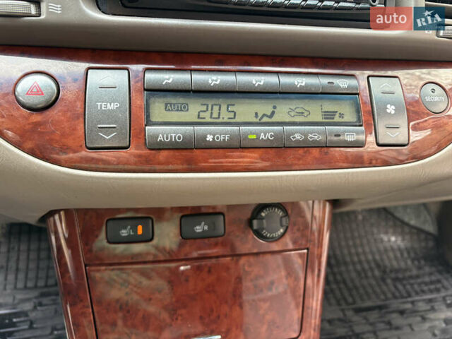 Черный Тойота Камри, объемом двигателя 2.4 л и пробегом 326 тыс. км за 6300 $, фото 20 на Automoto.ua